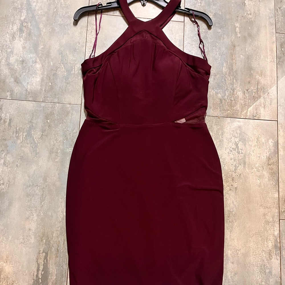 New with tags.  Dress barn dress. Burgundy size 10
